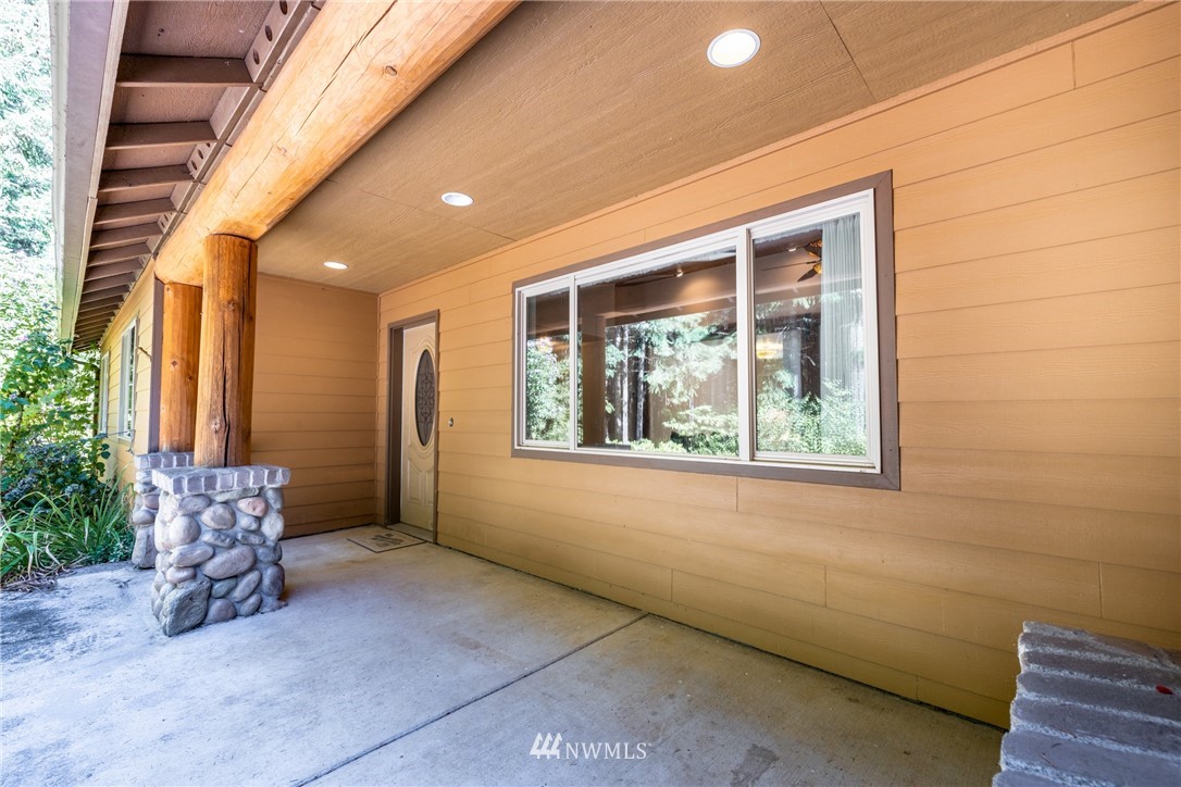 249 Coma Road Winlock, WA 98596 - Photo 6 of 38 an aerial view of a house with a yard pool a fire pit and outdoor seating