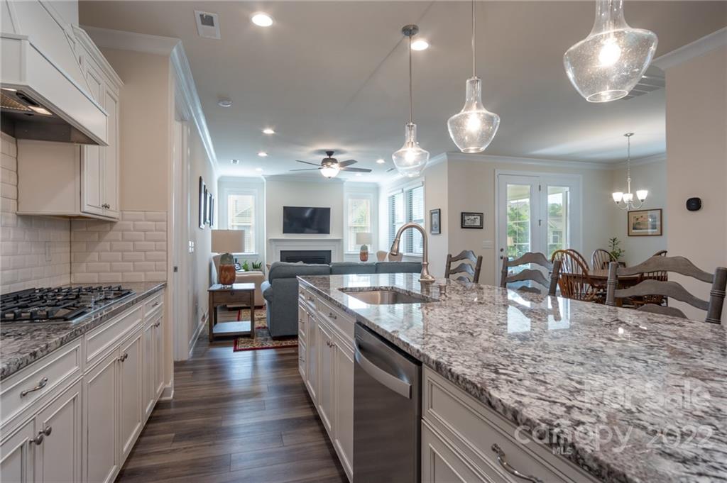 1213 Independence Street Tega Cay, SC 29708 - Photo 11 of 35 a kitchen with lots of counter space and stainless steel appliances