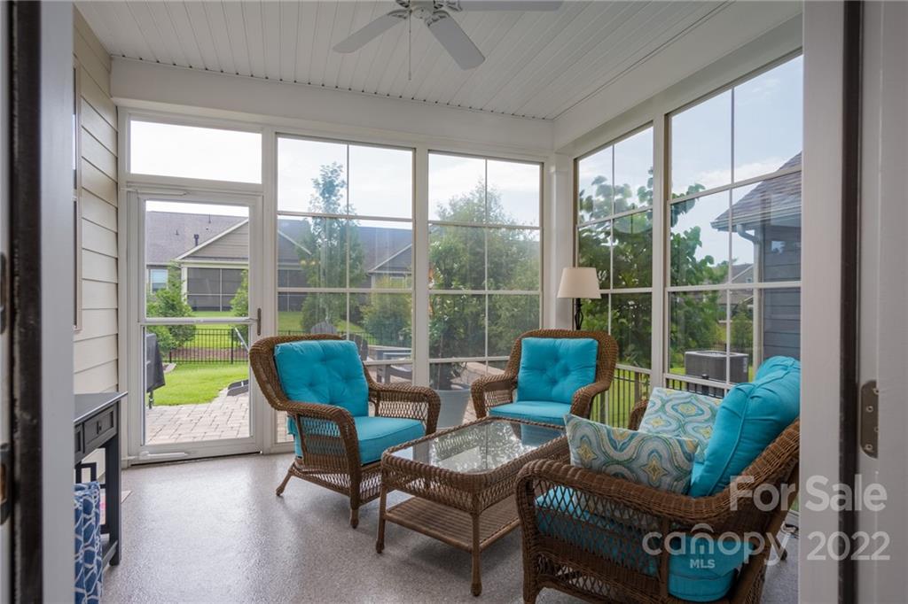 1213 Independence Street Tega Cay, SC 29708 - Photo 15 of 35 a balcony with furniture and a garden