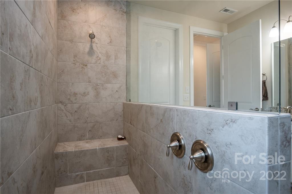 1213 Independence Street Tega Cay, SC 29708 - Photo 23 of 35 a bathroom with a bathtub