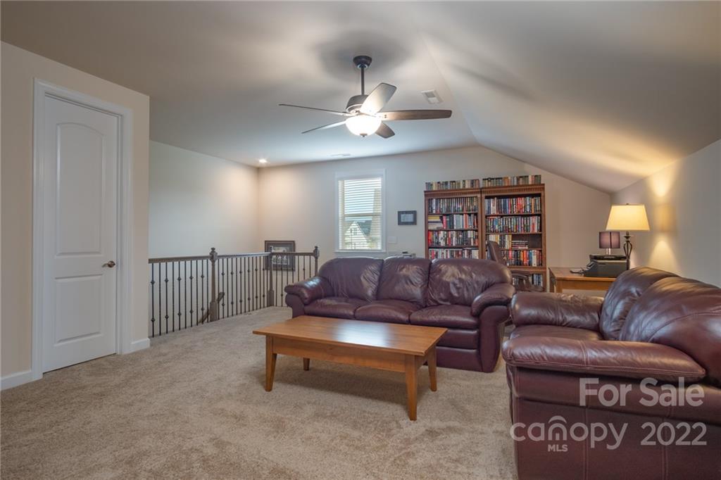 1213 Independence Street Tega Cay, SC 29708 - Photo 25 of 35 a living room with furniture