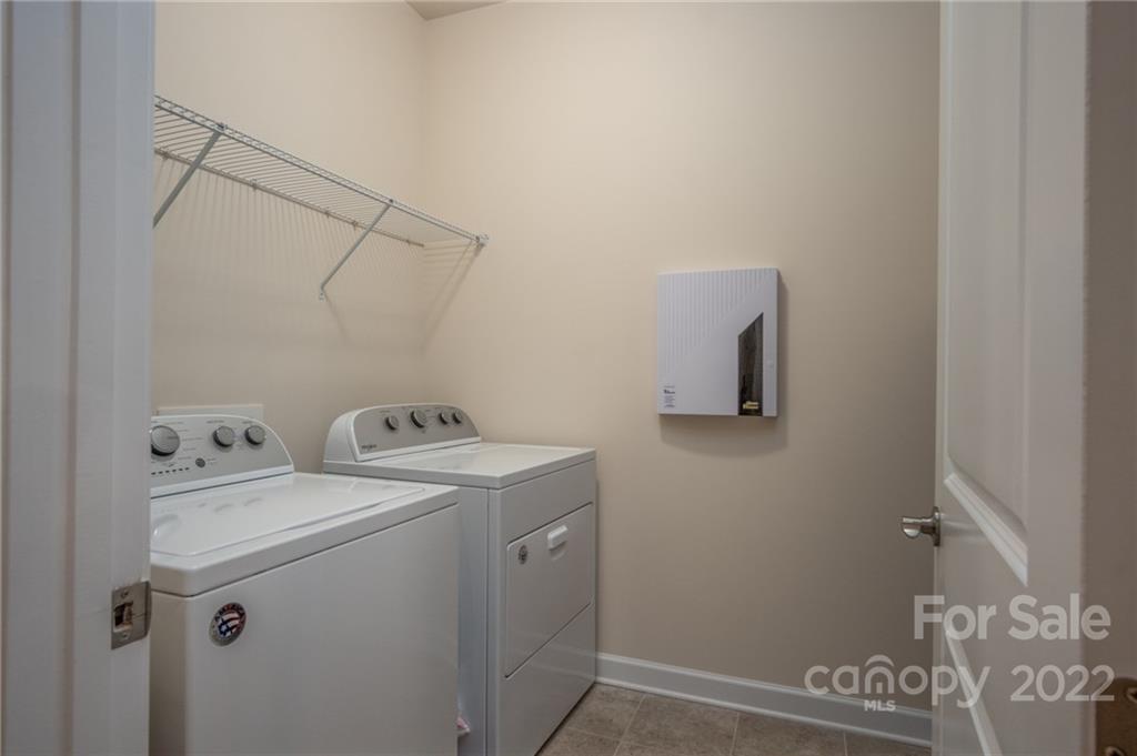 1213 Independence Street Tega Cay, SC 29708 - Photo 28 of 35 a utility room with dryer and washer
