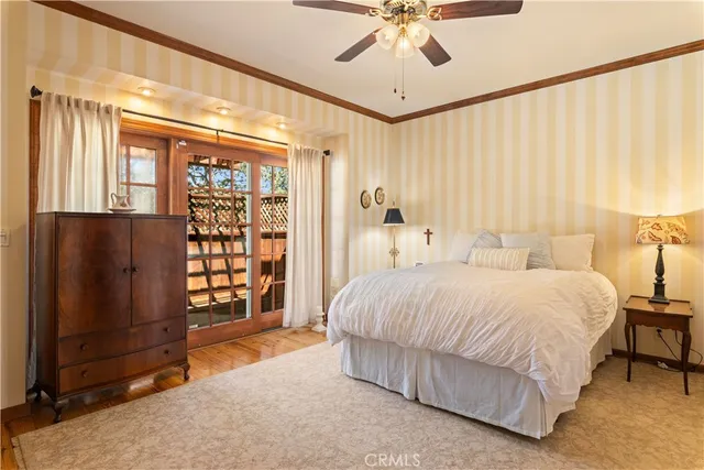 a bathroom with a glass door shower and a sink