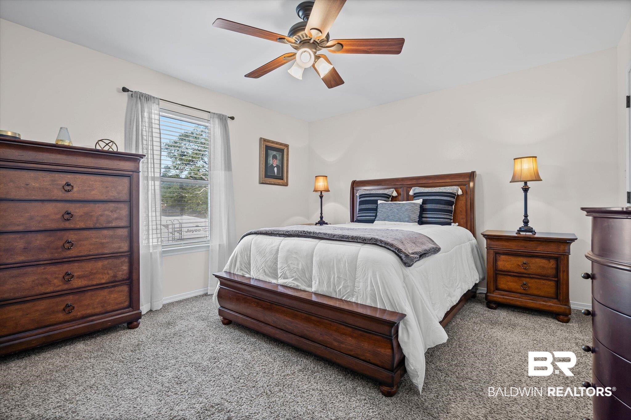 4567 Pine Avenue Saraland, AL 36571 - Photo 30 of 48 Bedroom with carpet floors and ceiling fan