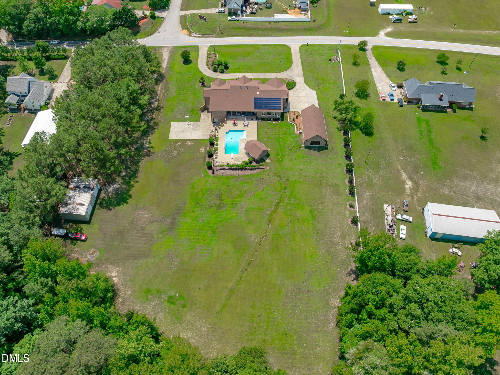 10917 Jordan Road Raleigh, NC 27603 - Photo 56 of 58 an aerial view of a house with a yard basket ball court and outdoor seating