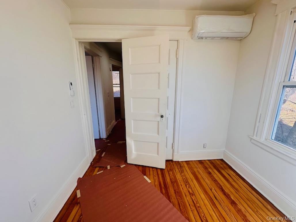 5517 Fieldston Road Bronx, NY 10471 - Photo 26 of 28 wooden floor in an empty room