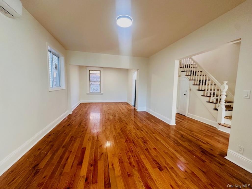 5517 Fieldston Road Bronx, NY 10471 - Photo 4 of 28 a view of an empty room with wooden floor
