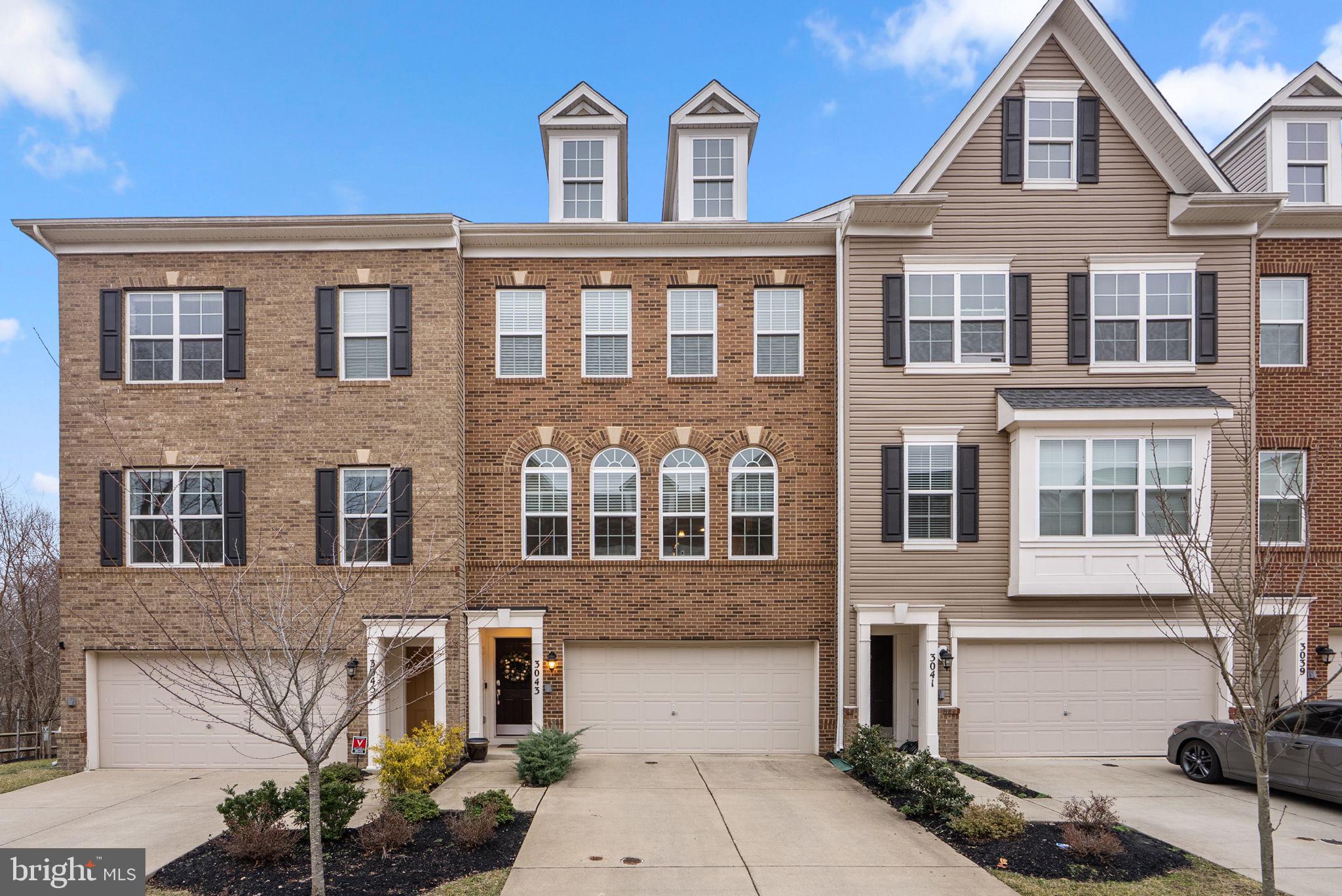 3043 Mia Lane Bowie, MD 20721 - Photo 1 of 44 a front view of a house