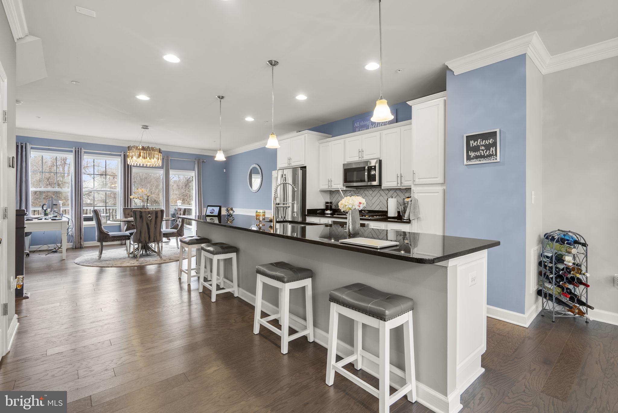 3043 Mia Lane Bowie, MD 20721 - Photo 11 of 44 a kitchen with counter top space a sink appliances and cabinets