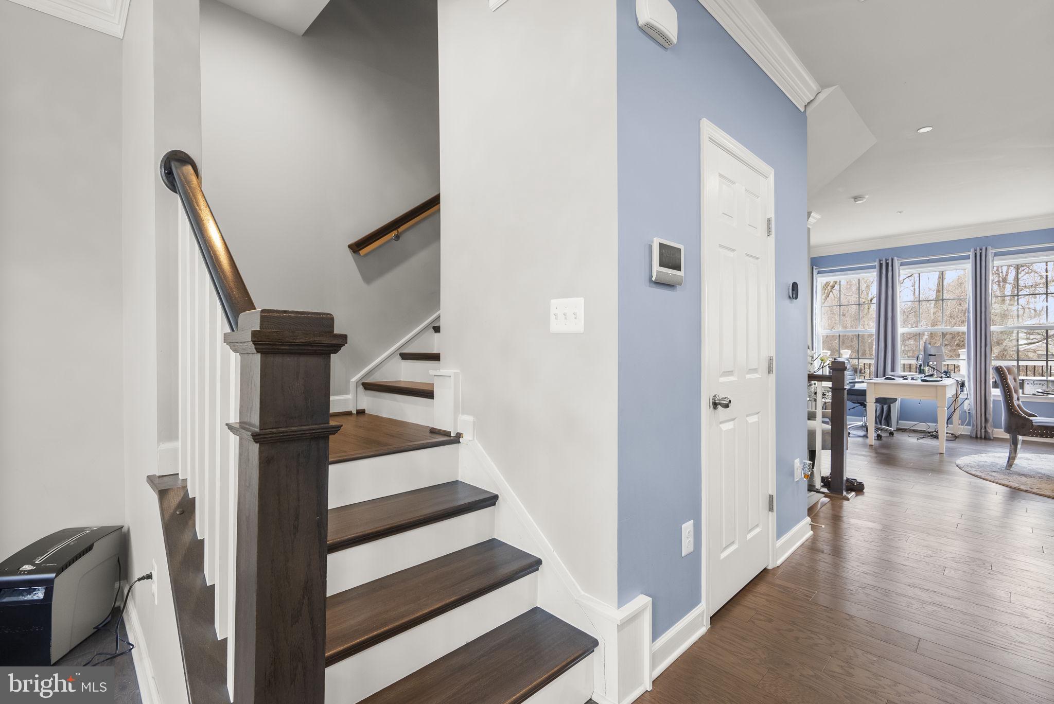 3043 Mia Lane Bowie, MD 20721 - Photo 22 of 44 a view of a livingroom with furniture and staircase