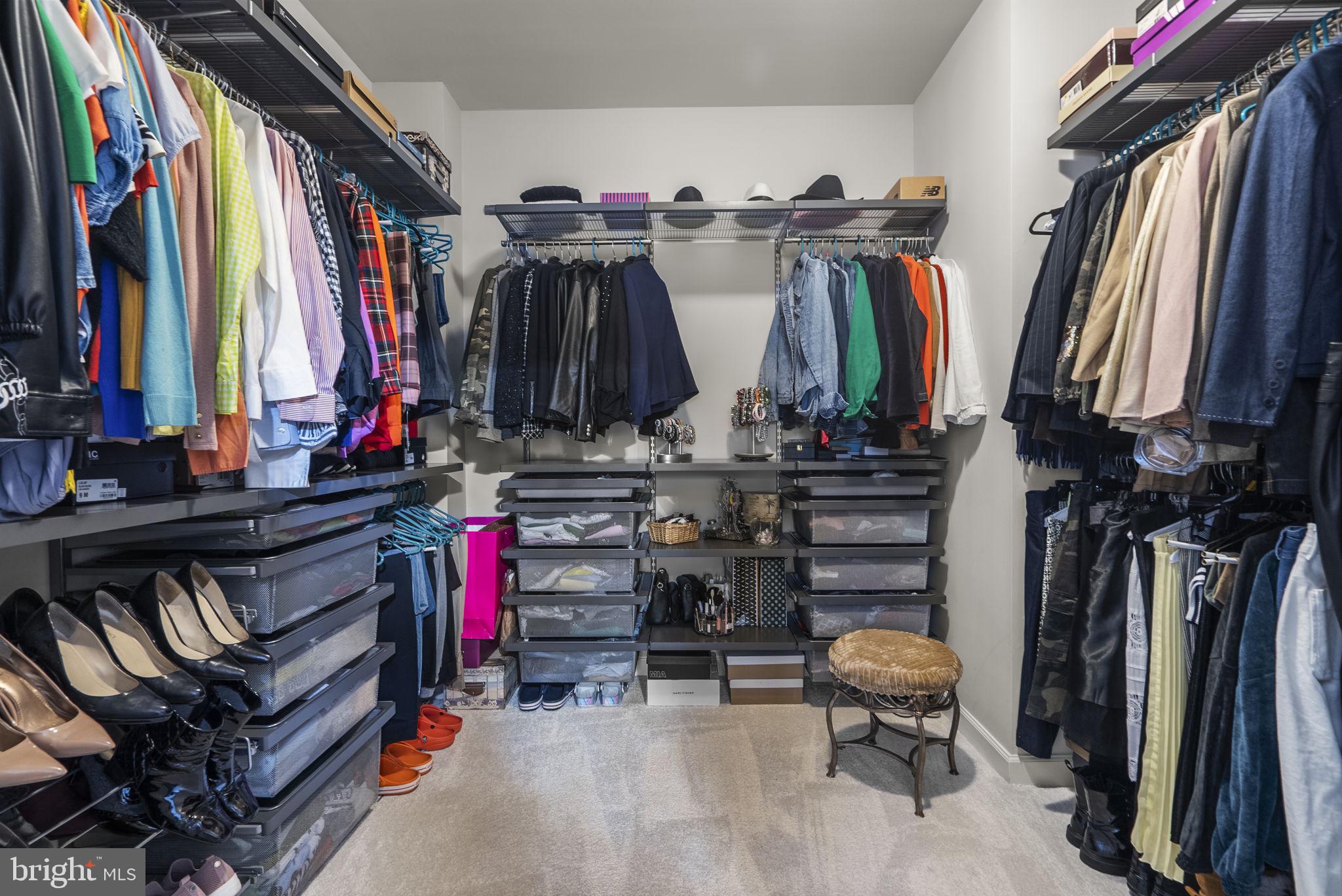 3043 Mia Lane Bowie, MD 20721 - Photo 26 of 44 a view of walk in closet with clothes and shoes