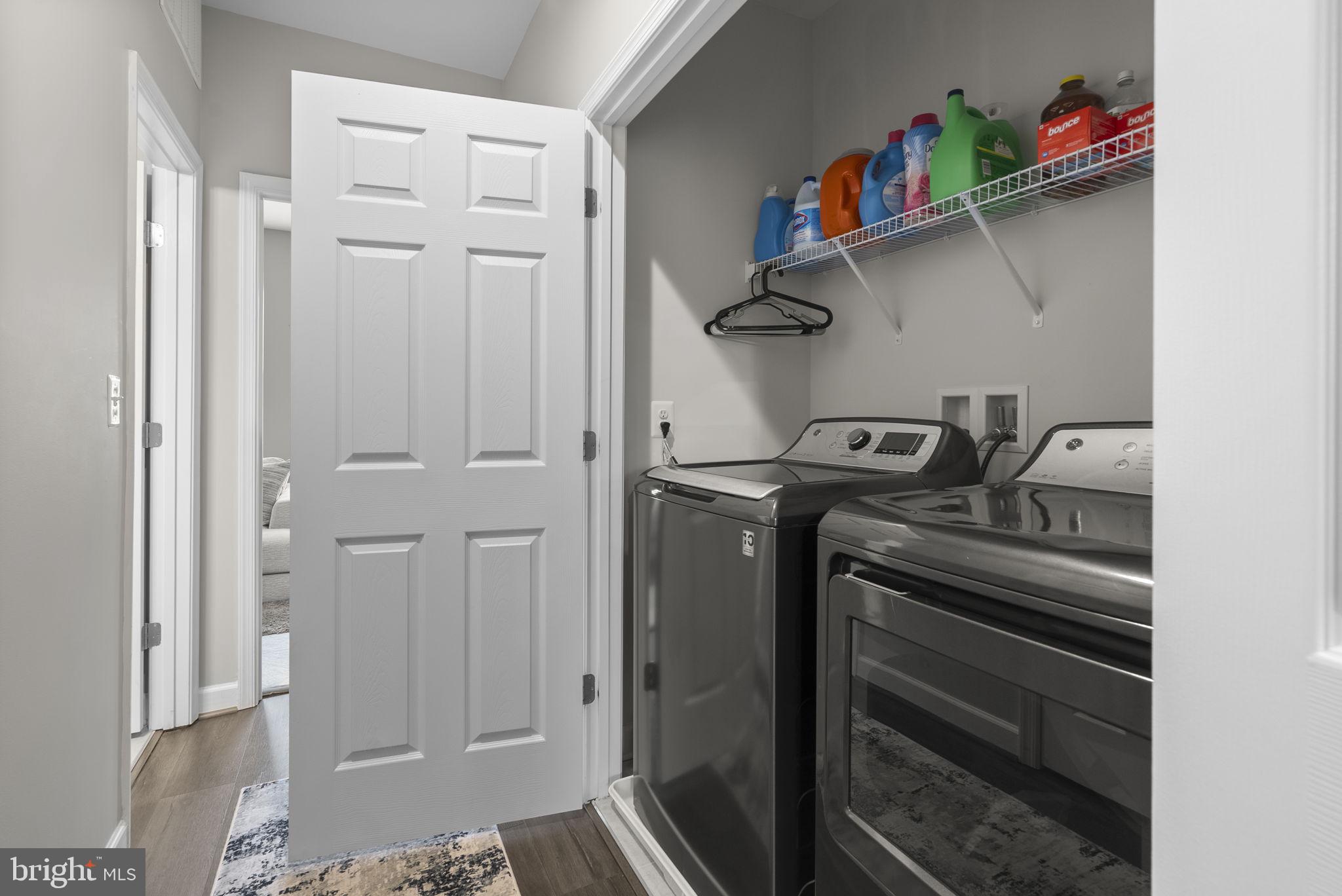 3043 Mia Lane Bowie, MD 20721 - Photo 36 of 44 a view of storage and utility room with racks on the wall