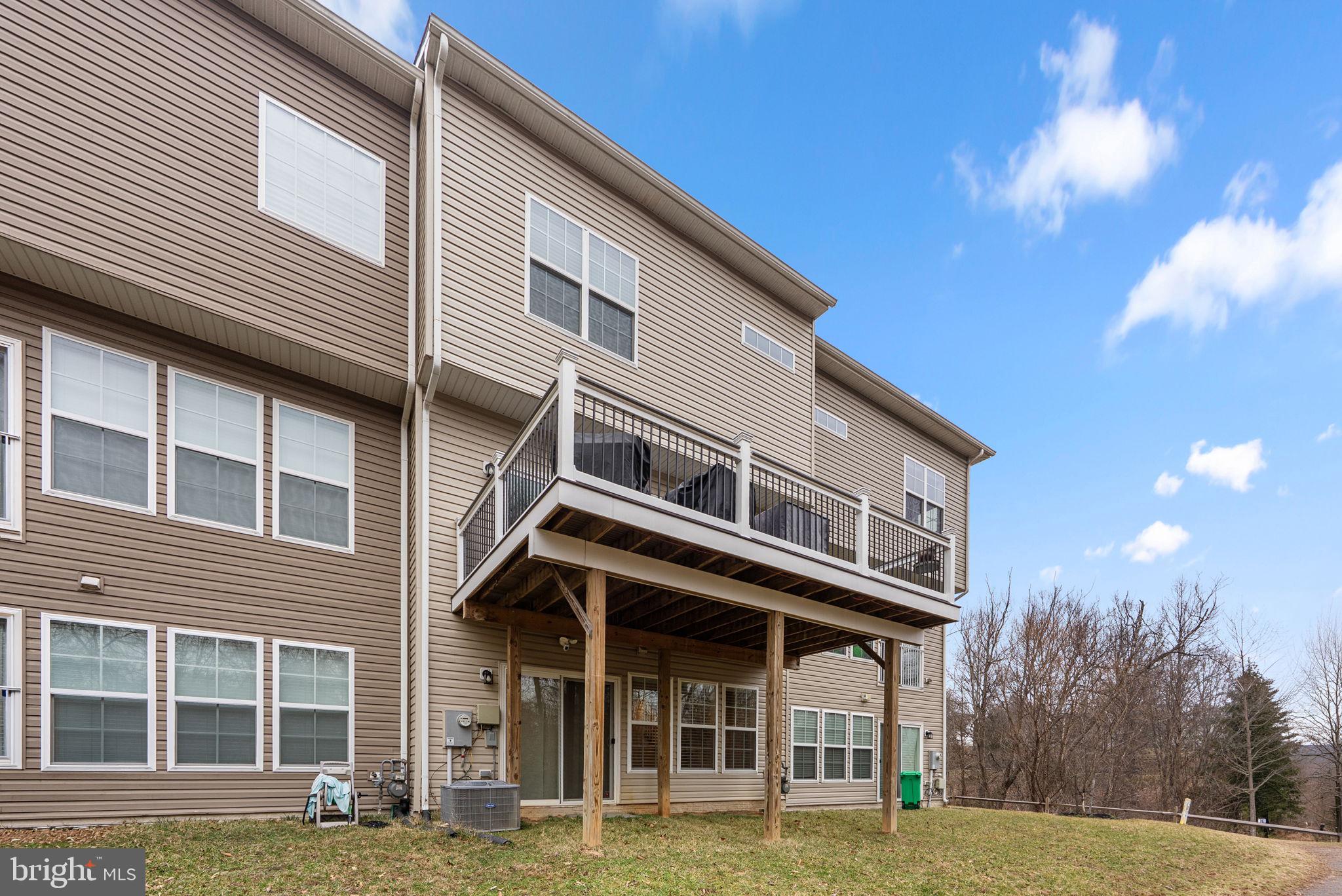 3043 Mia Lane Bowie, MD 20721 - Photo 43 of 44 a front view of a house with a yard