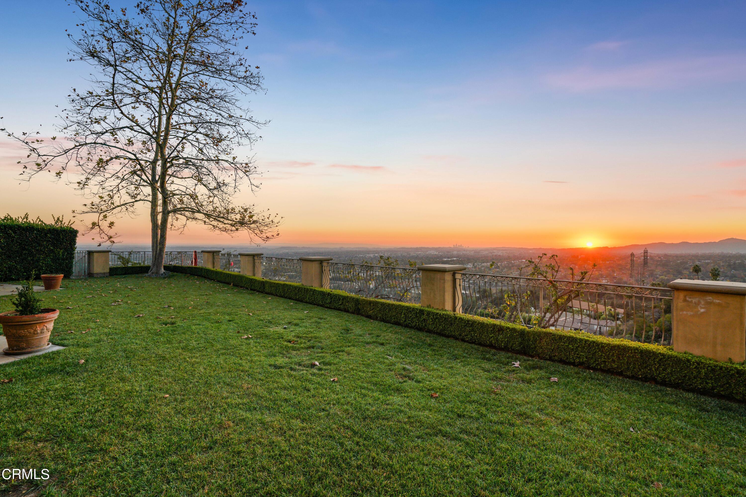 2323 Crystal Lane Pasadena, CA 91107 - Photo 61 of 72 a view of a green field with wooden fence