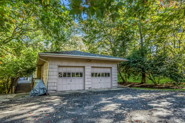 a view of a house with a garage