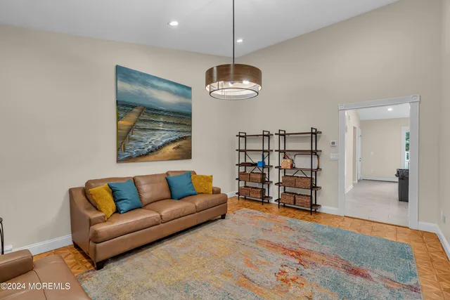 a bathroom with a toilet a sink and a mirror