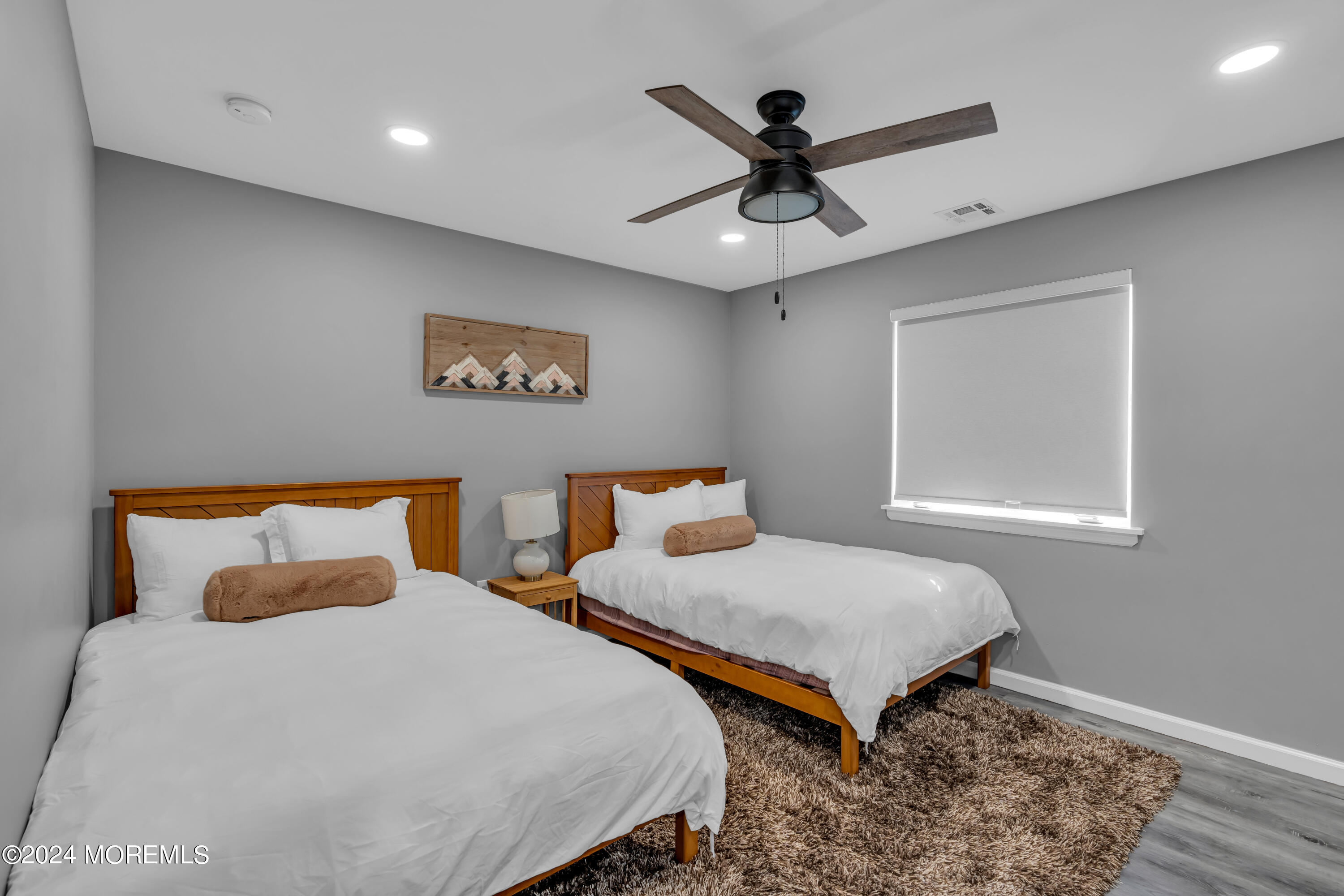 222 Bartley Road Jackson, NJ 08527 - Photo 54 of 78 a bedroom with two beds and painting on the wall
