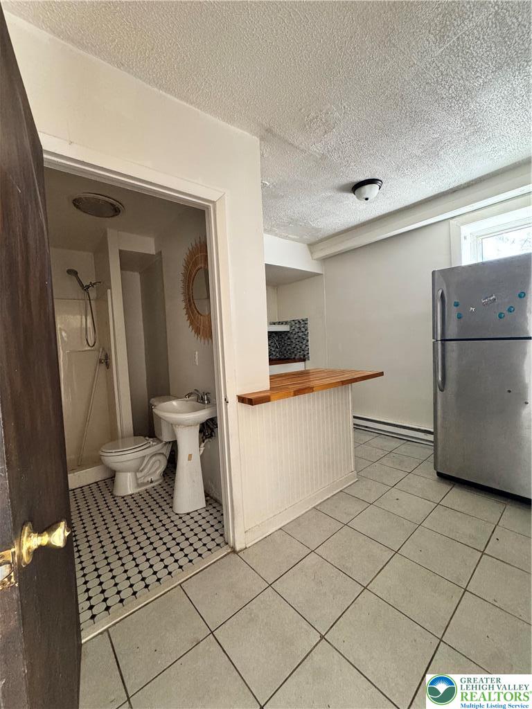 1218 Mechanic Street, Unit 2 Bethlehem, PA 18015 - Photo 6 of 9 a view of a storage & utility room with a sink