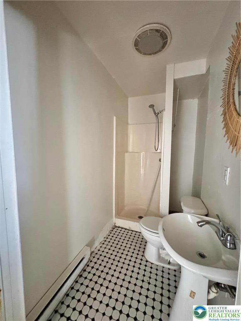 1218 Mechanic Street, Unit 2 Bethlehem, PA 18015 - Photo 8 of 9 a bathroom with a sink and a mirror