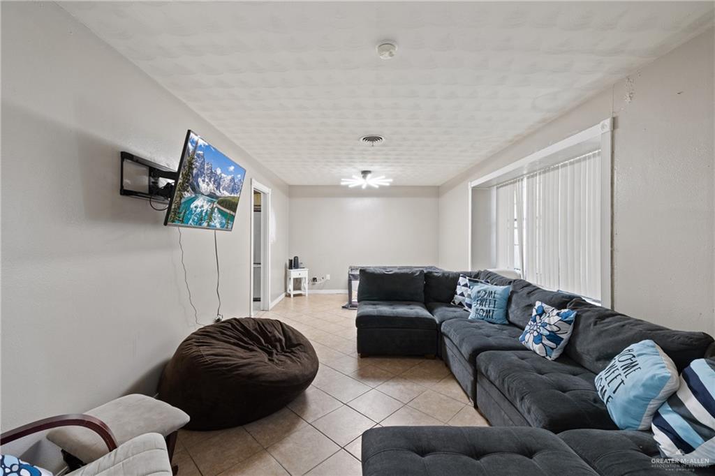 320 Violet Avenue Mission, TX 78574 - Photo 2 of 14 a living room with furniture and a couch