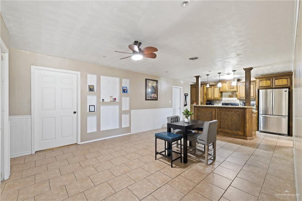 320 Violet Avenue Mission, TX 78574 - Photo 3 of 14 a view of a dining room with furniture