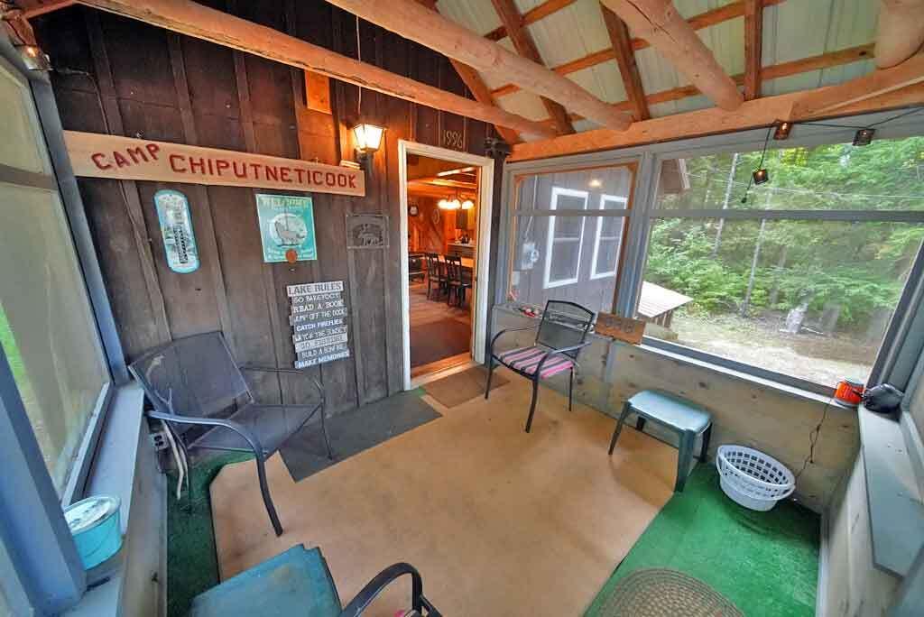 638 Sandy Beach Road Danforth, ME 04424 - Photo 35 of 94 porch-room-lake-home