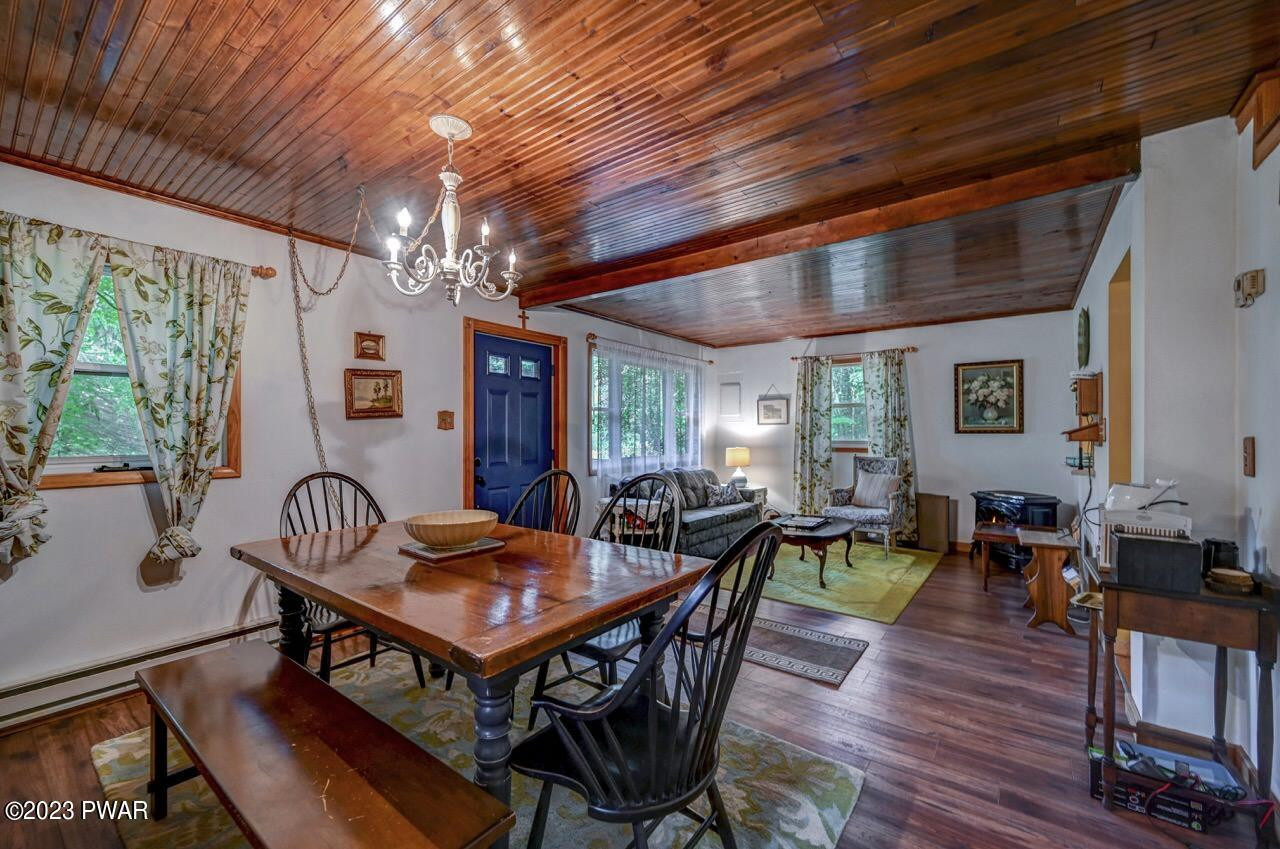 20 Wash Road Waymart, PA 18472 - Photo 4 of 49 a view of a dining room with furniture window and wooden floor