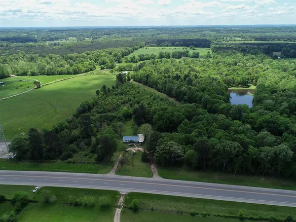 a view of a garden with an outdoor space
