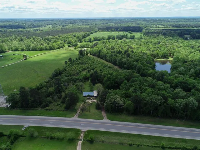 a view of a garden with an outdoor space