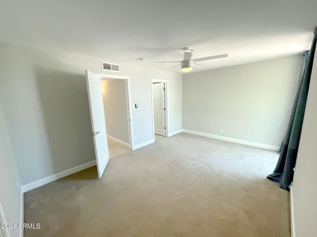 an empty room with a bathroom