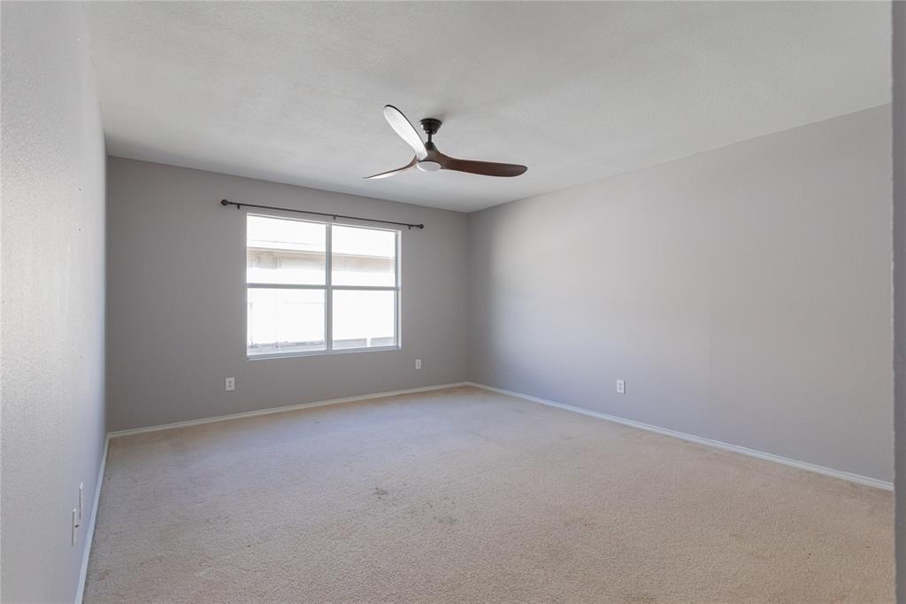 149 Independence Avenue Venus, TX 76084 - Photo 14 of 31 wooden floor in an empty room with a window