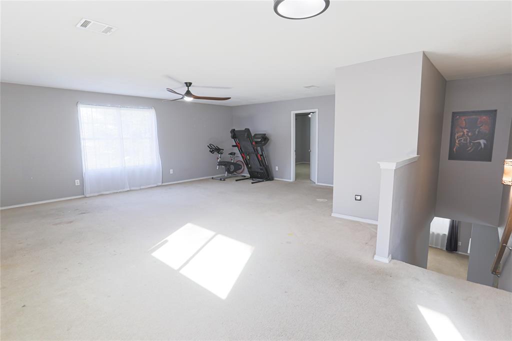 149 Independence Avenue Venus, TX 76084 - Photo 16 of 31 a view of an empty room with a window