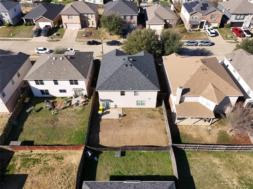 149 Independence Avenue Venus, TX 76084 - Photo 22 of 31 an aerial view of multiple houses with outdoor space
