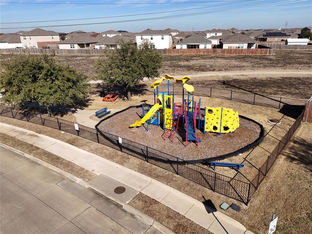 149 Independence Avenue Venus, TX 76084 - Photo 24 of 31 a view of a swimming pool with a patio