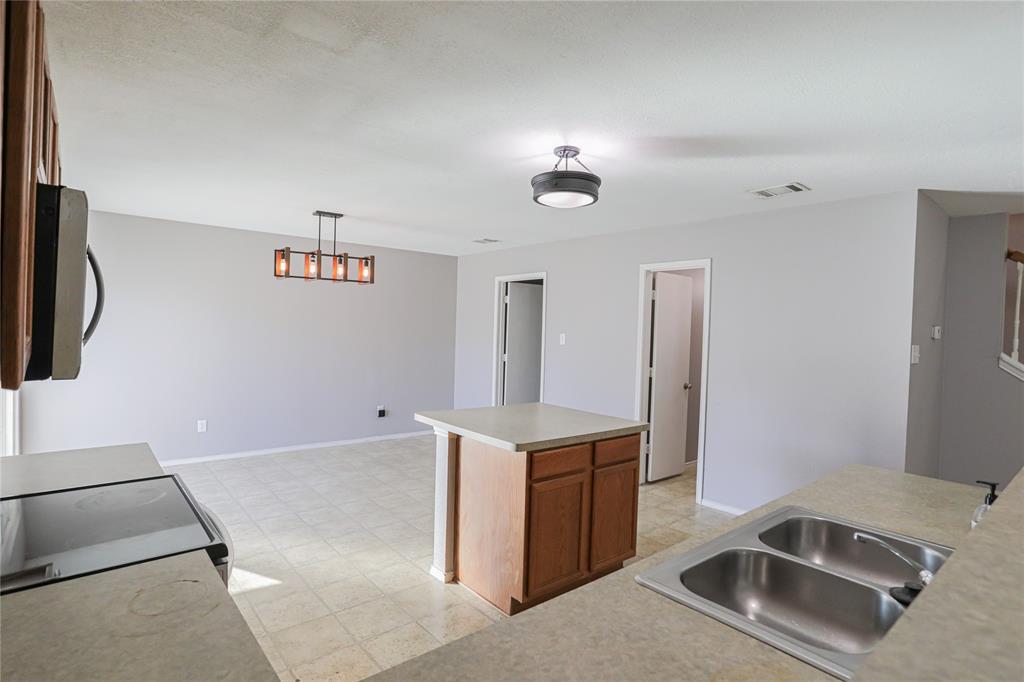 149 Independence Avenue Venus, TX 76084 - Photo 10 of 31 a room with storage and utility