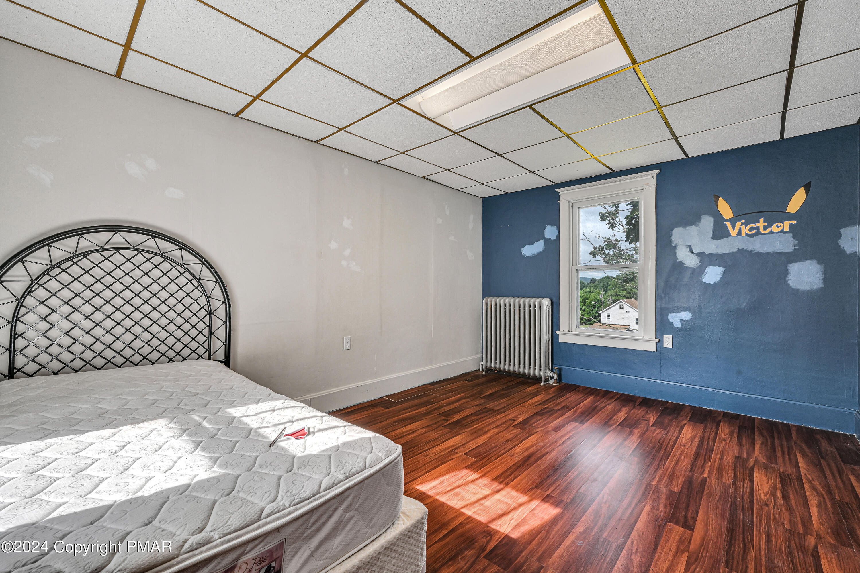 128 North West Street Williamstown, PA 17098 - Photo 16 of 23 a bedroom with a bed and a window