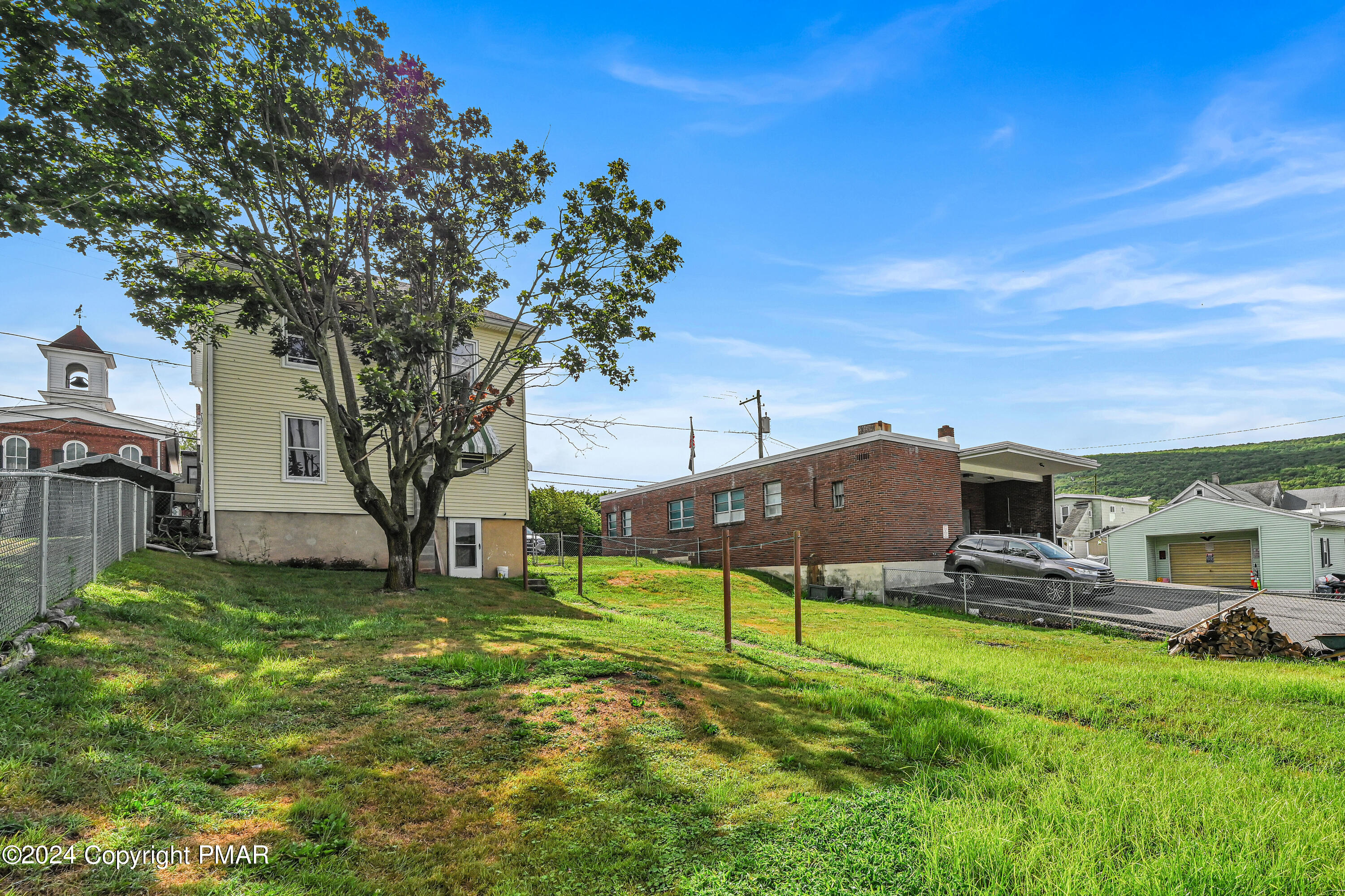 128 North West Street Williamstown, PA 17098 - Photo 21 of 23 a view of a chairs and tables in the big yard