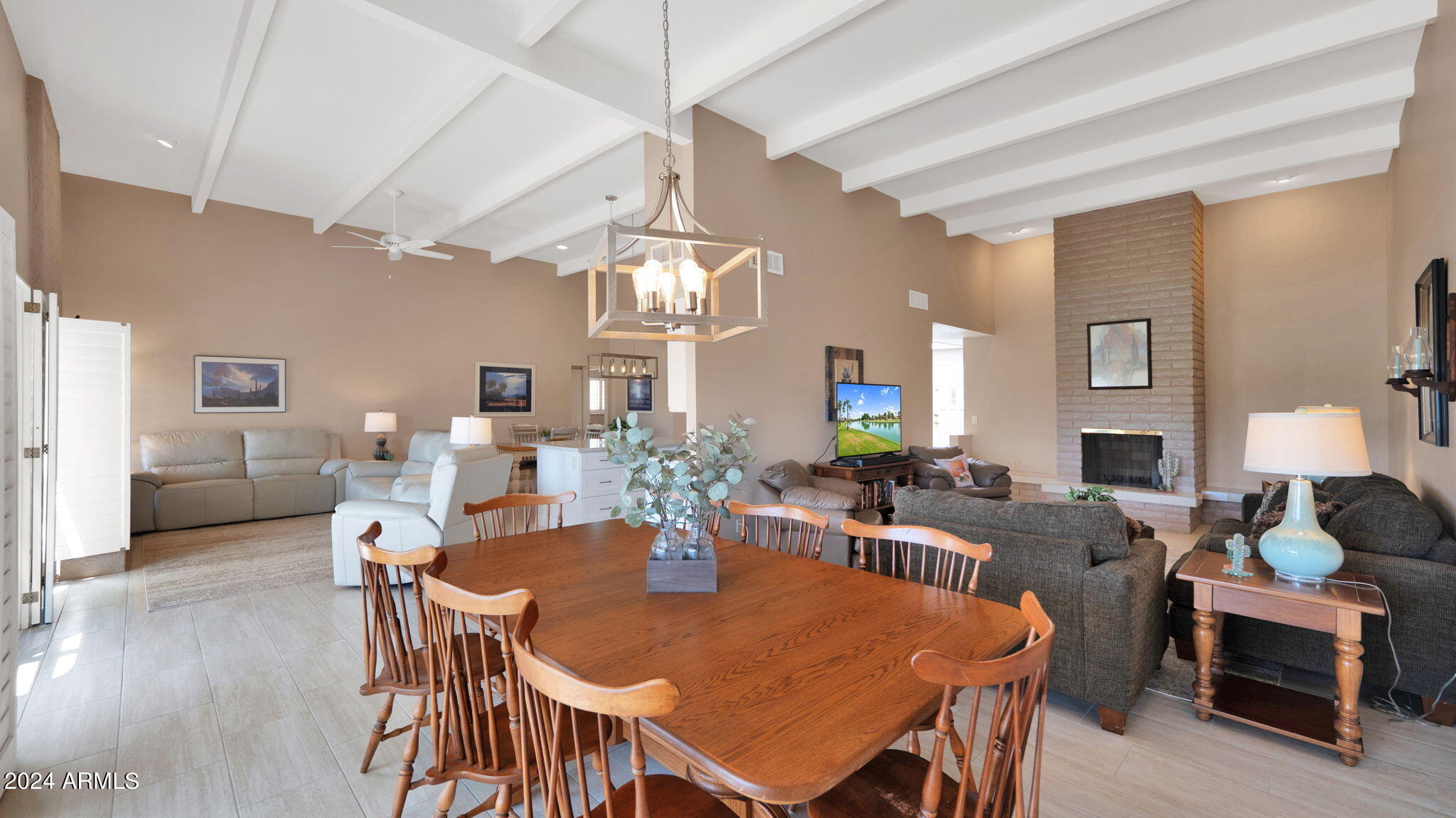 7819 East Vía Rio Scottsdale, AZ 85258 - Photo 20 of 42 a view of a dining room with furniture and wooden floor