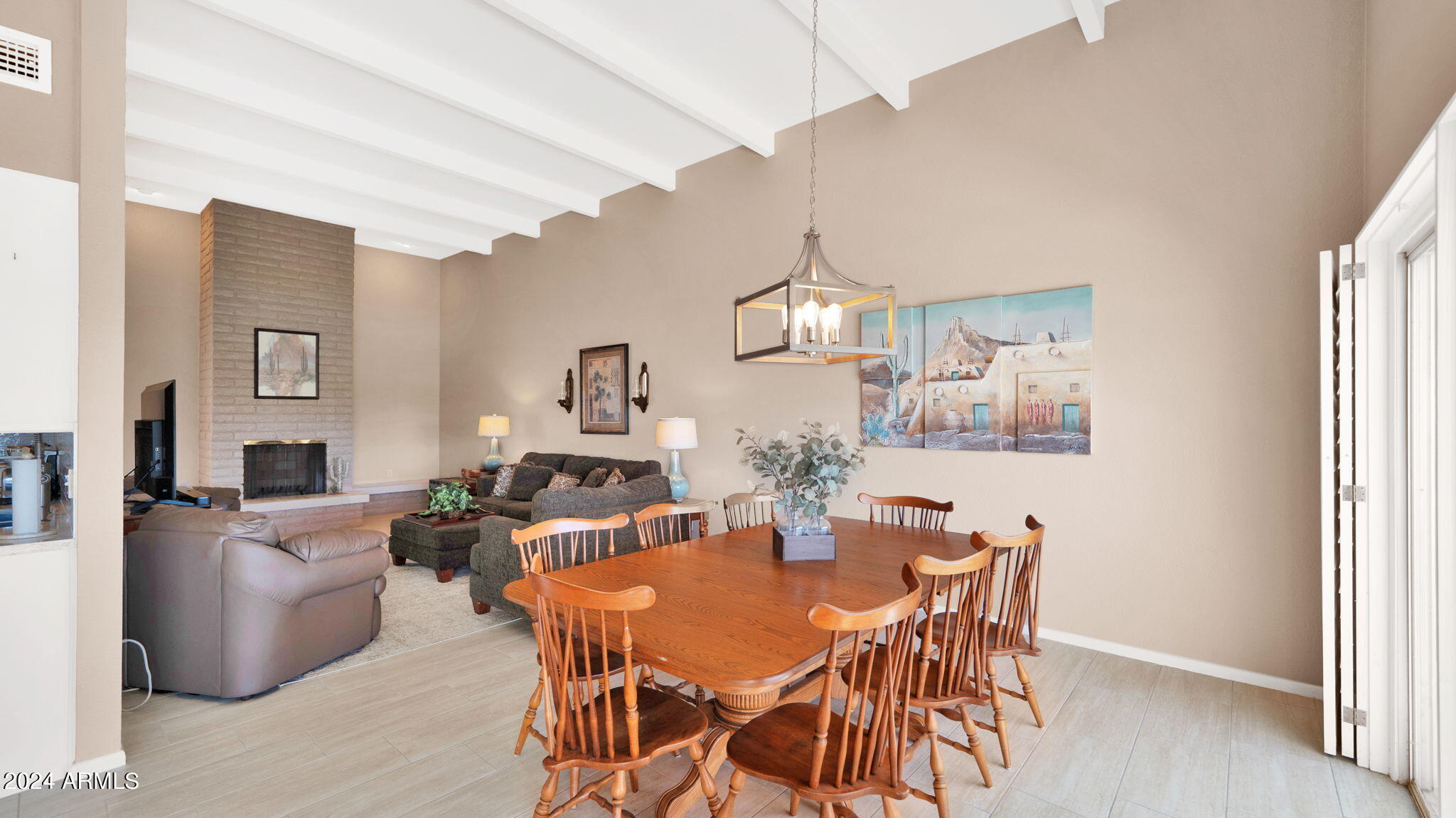 7819 East Vía Rio Scottsdale, AZ 85258 - Photo 21 of 42 a view of a dining room with furniture