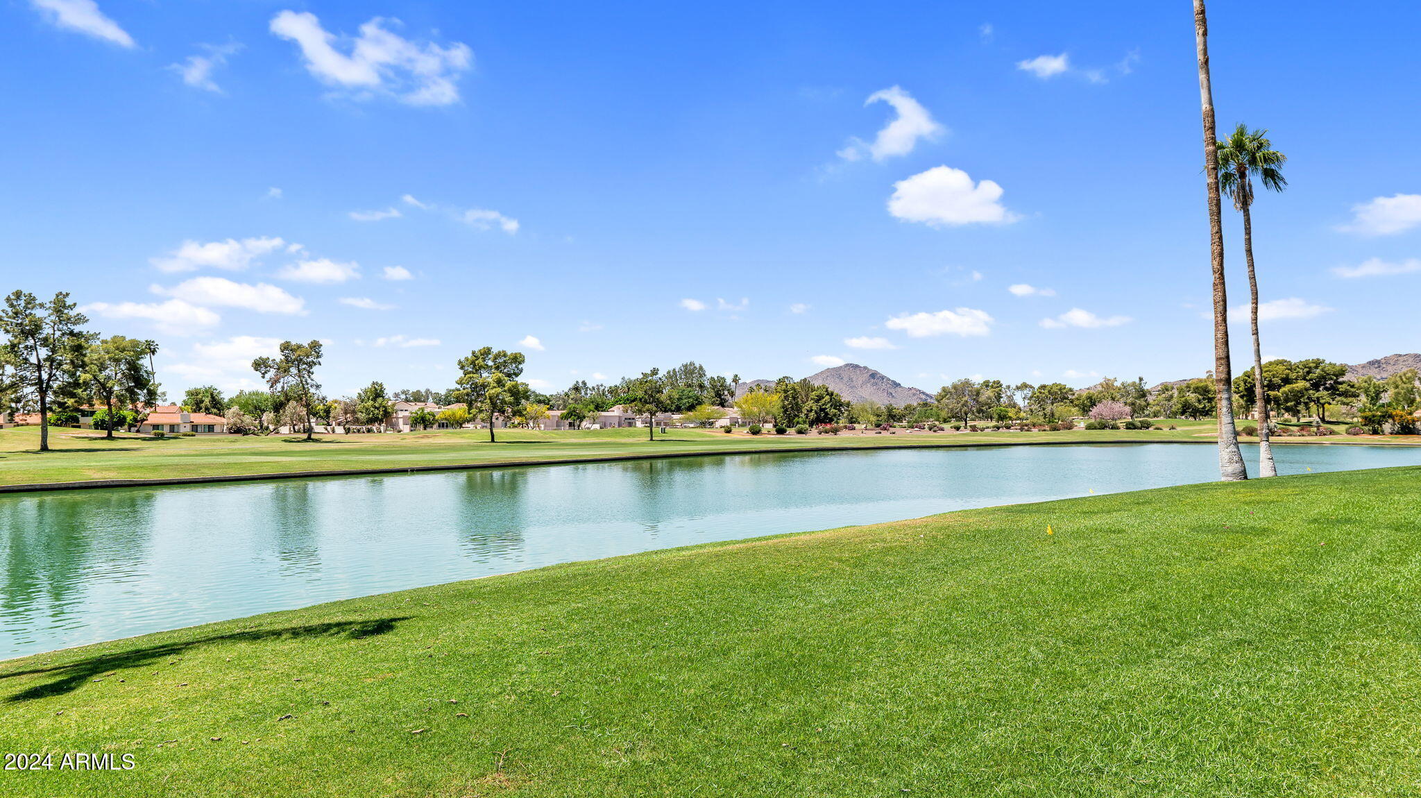 7819 East Vía Rio Scottsdale, AZ 85258 - Photo 39 of 42 a view of a lake with houses