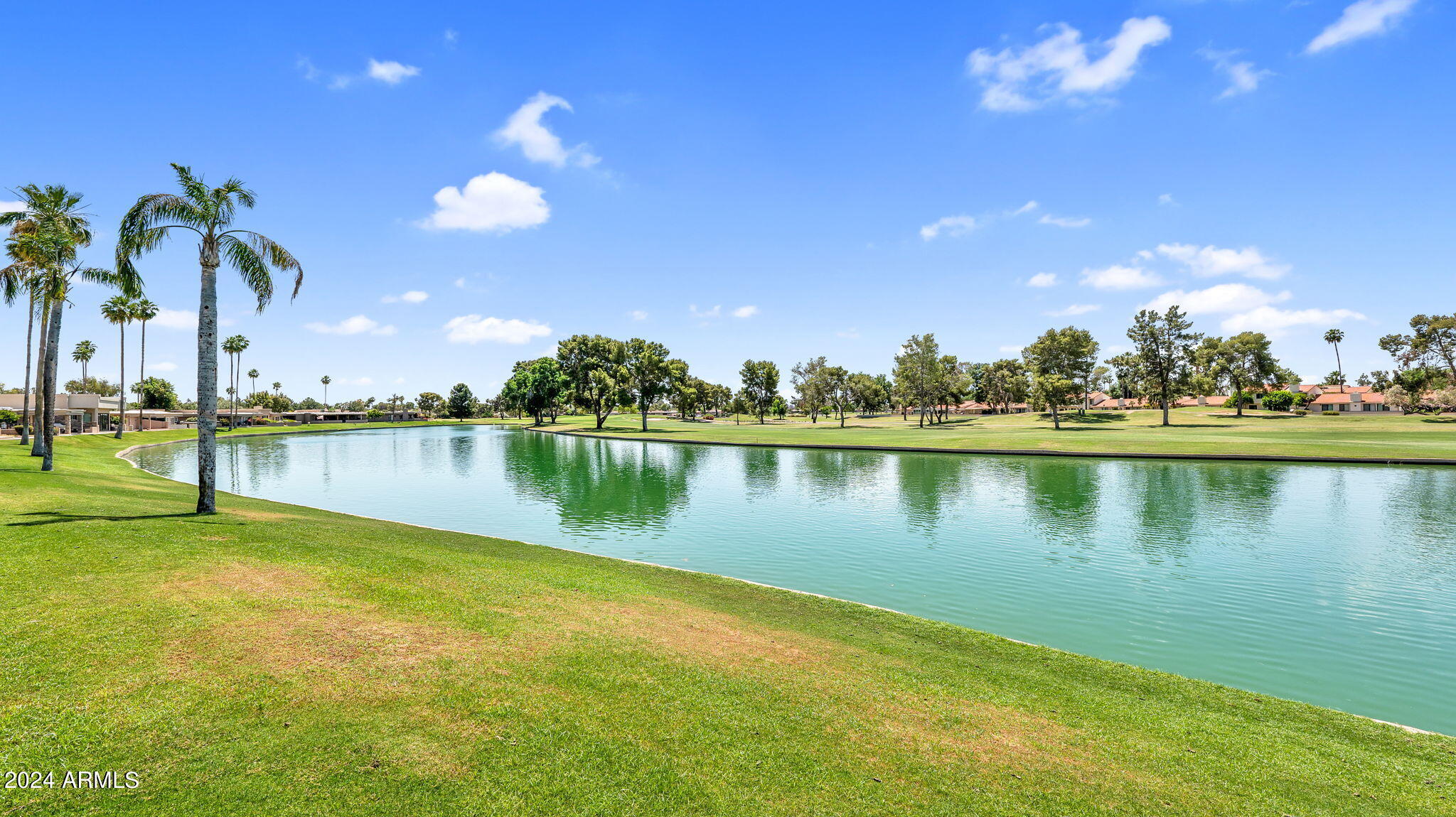 7819 East Vía Rio Scottsdale, AZ 85258 - Photo 40 of 42 a view of a lake with a big yard