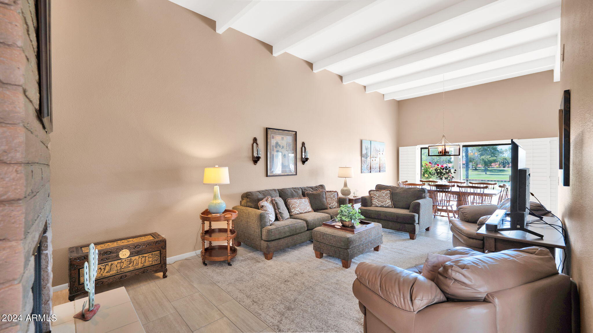 7819 East Vía Rio Scottsdale, AZ 85258 - Photo 7 of 42 a living room with furniture and a large window
