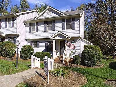 1406 Mapleside Court Raleigh, NC 27609 - Photo 1 of 1 front view of a house with a yard