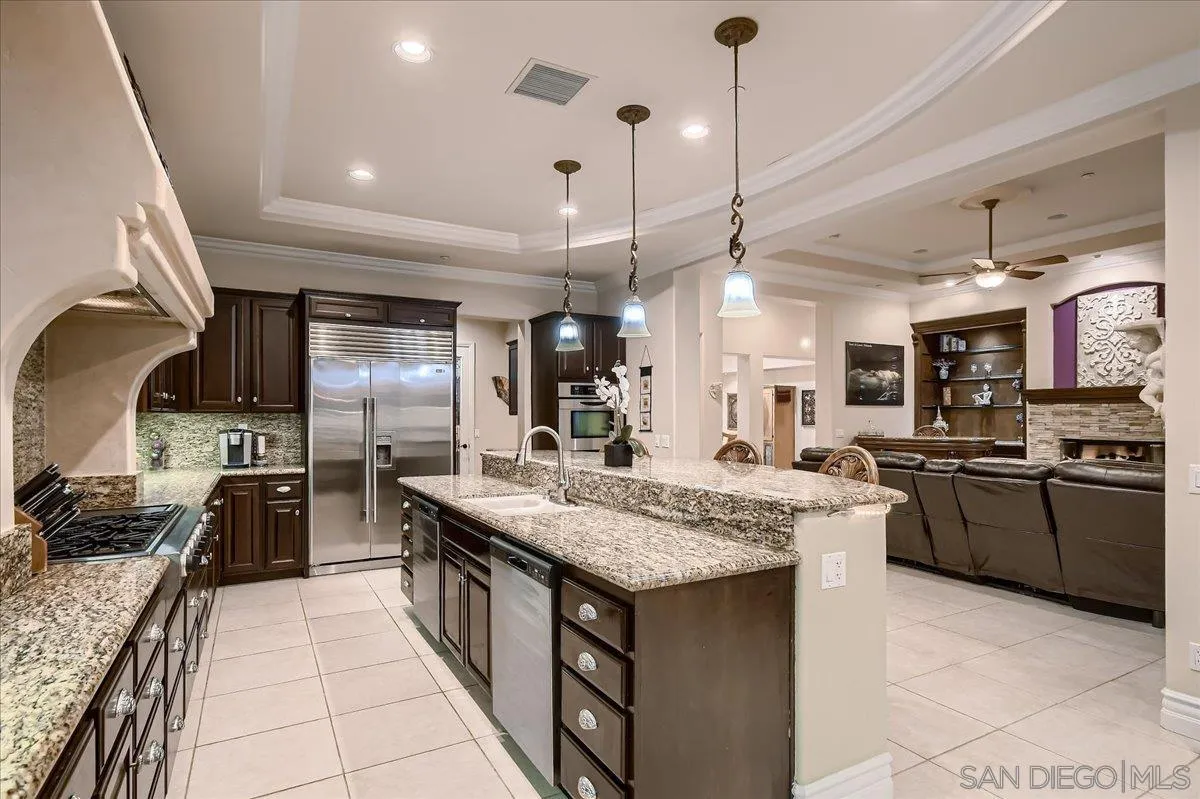 3349 Mendenaro Court Fallbrook, CA 92028 - Photo 14 of 34 a kitchen with lots of counter top space