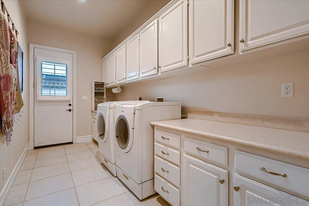3349 Mendenaro Court Fallbrook, CA 92028 - Photo 16 of 34 a utility room with dryer and washer