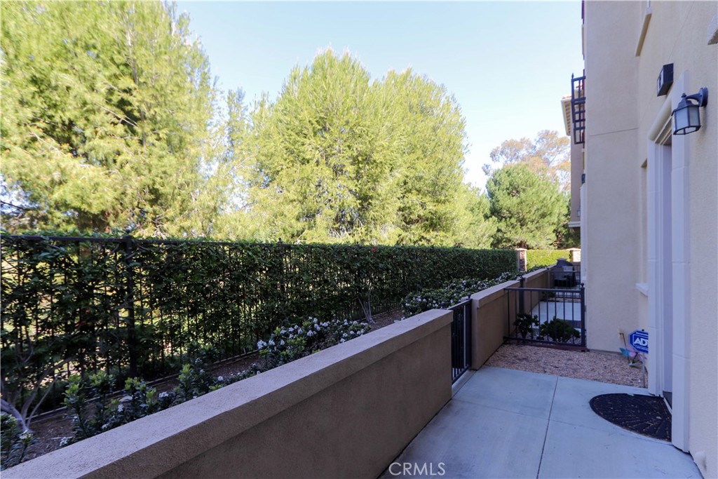 47 Aliso Ridge Loop Mission Viejo, CA 92691 - Photo 5 of 49 Patio area open to the downstairs room