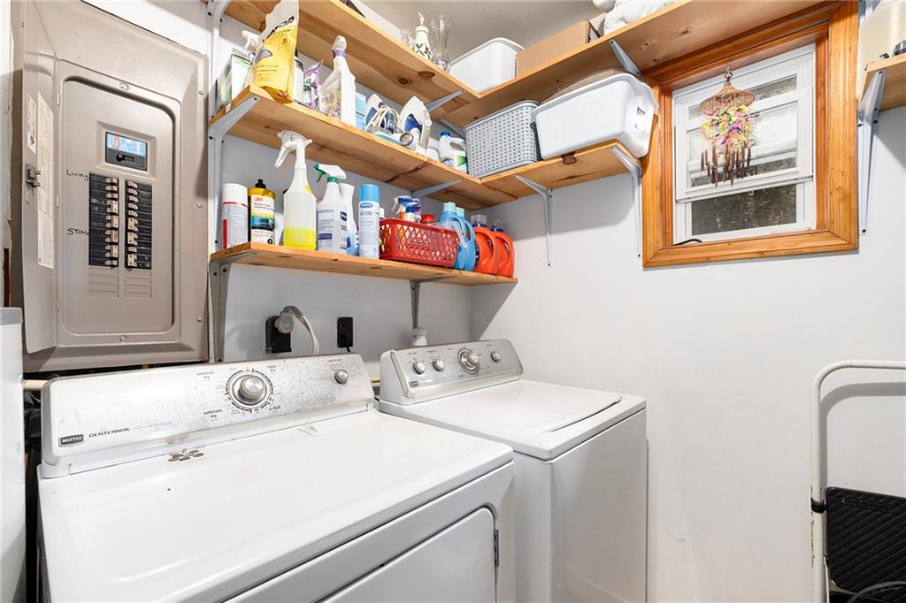 1246 Duncan Bridge Road Cornelia, GA 30531 - Photo 11 of 21 a utility room with dryer and washer