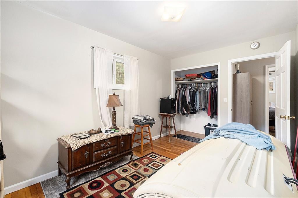 1246 Duncan Bridge Road Cornelia, GA 30531 - Photo 14 of 21 a bedroom with a bed and a flat screen tv