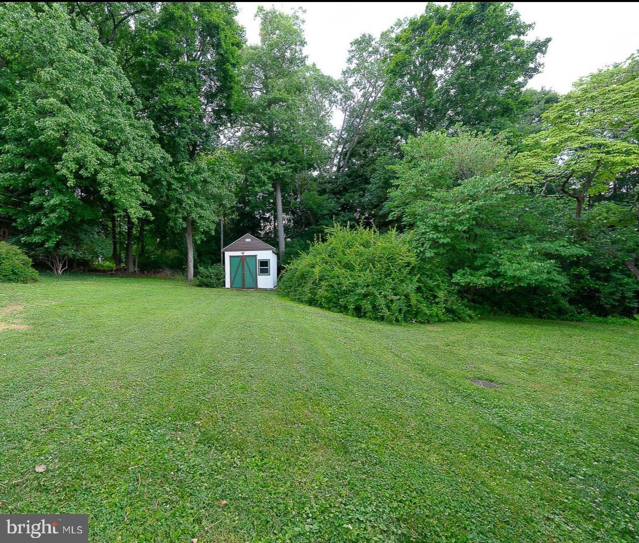 213 North Fairfield Road Devon, PA 19333 - Photo 49 of 50 Serene backyard retreat with greenery.
