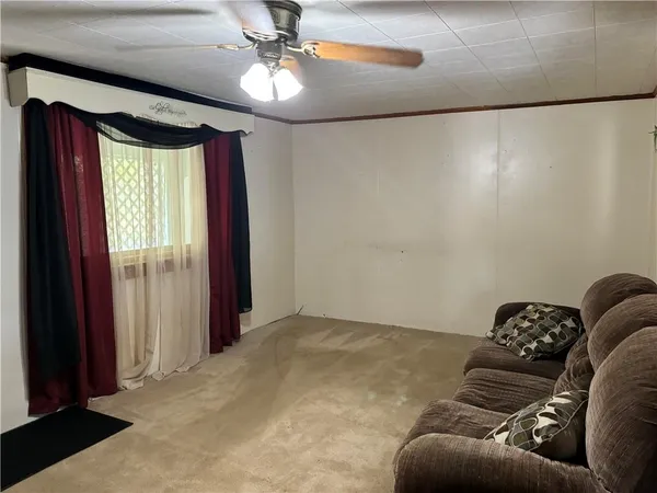 a bed room with a bed and a chandelier